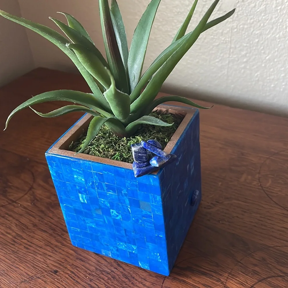 Faux succulent in deep blue dyed shell mosaic cube.